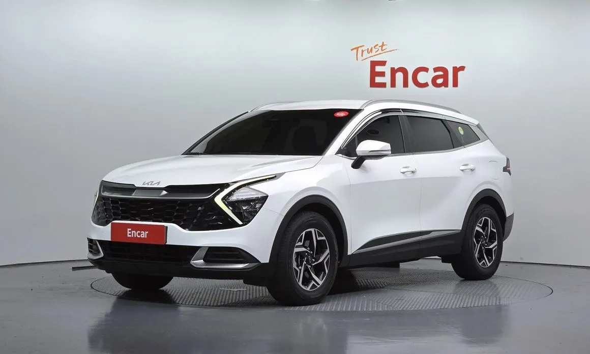 Kia Sportage — фото 1