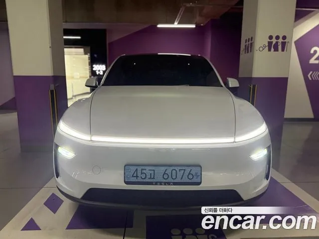 Tesla Model Y — фото 1