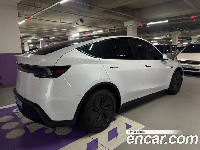 Tesla Model Y — фото 2