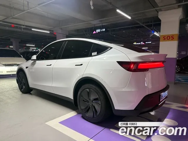 Tesla Model Y — фото 3