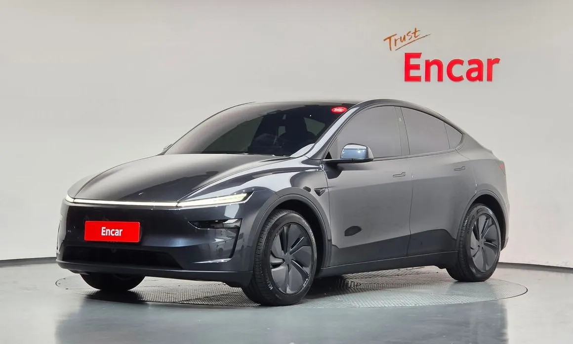 Tesla Model Y — фото 1