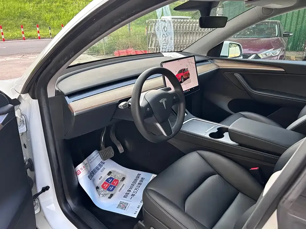 Tesla Model Y — фото 7