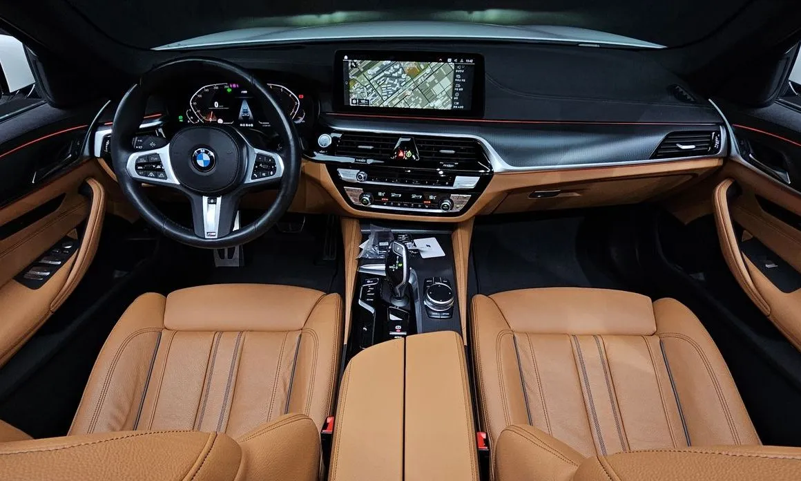 BMW 5-Series — фото 10
