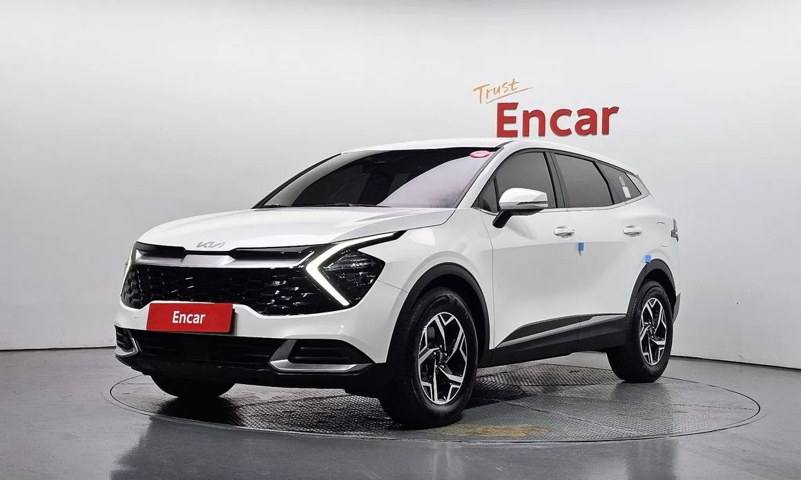 Kia Sportage — фото 1