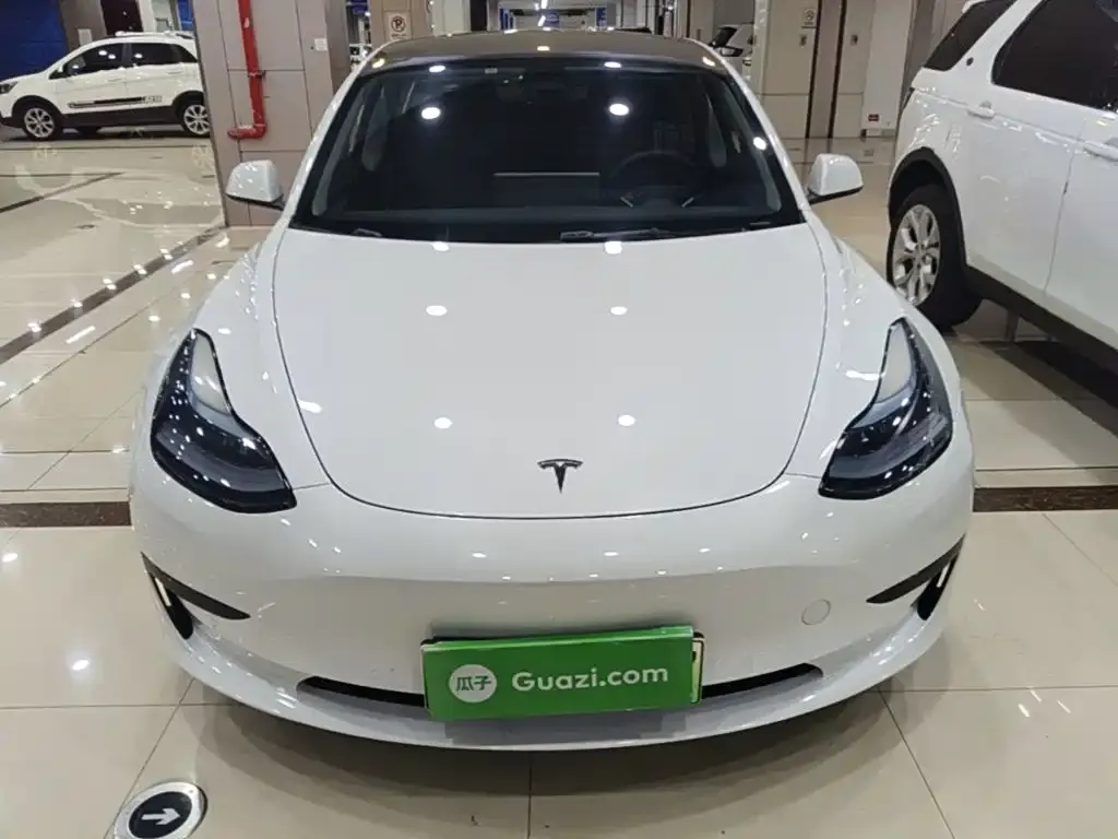Tesla Model 3 — фото 9