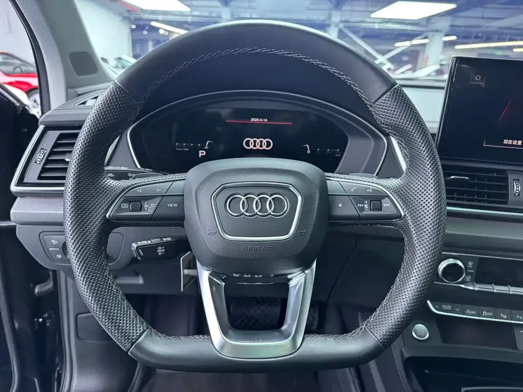 Audi Q5L — фото 6