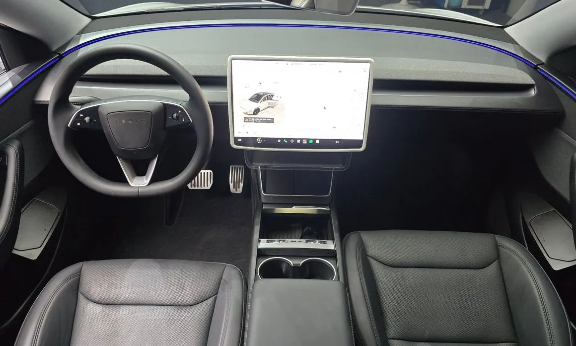 Tesla Model Y — фото 10