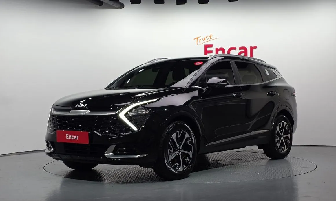 Kia Sportage — фото 1