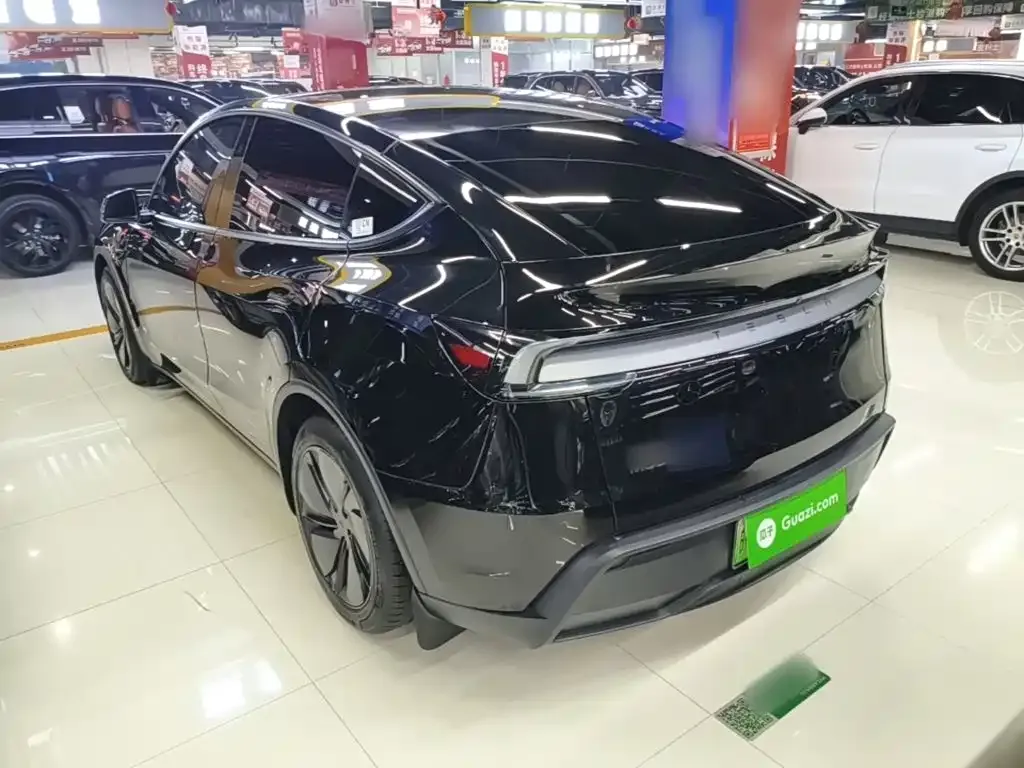 Tesla Model Y — фото 7