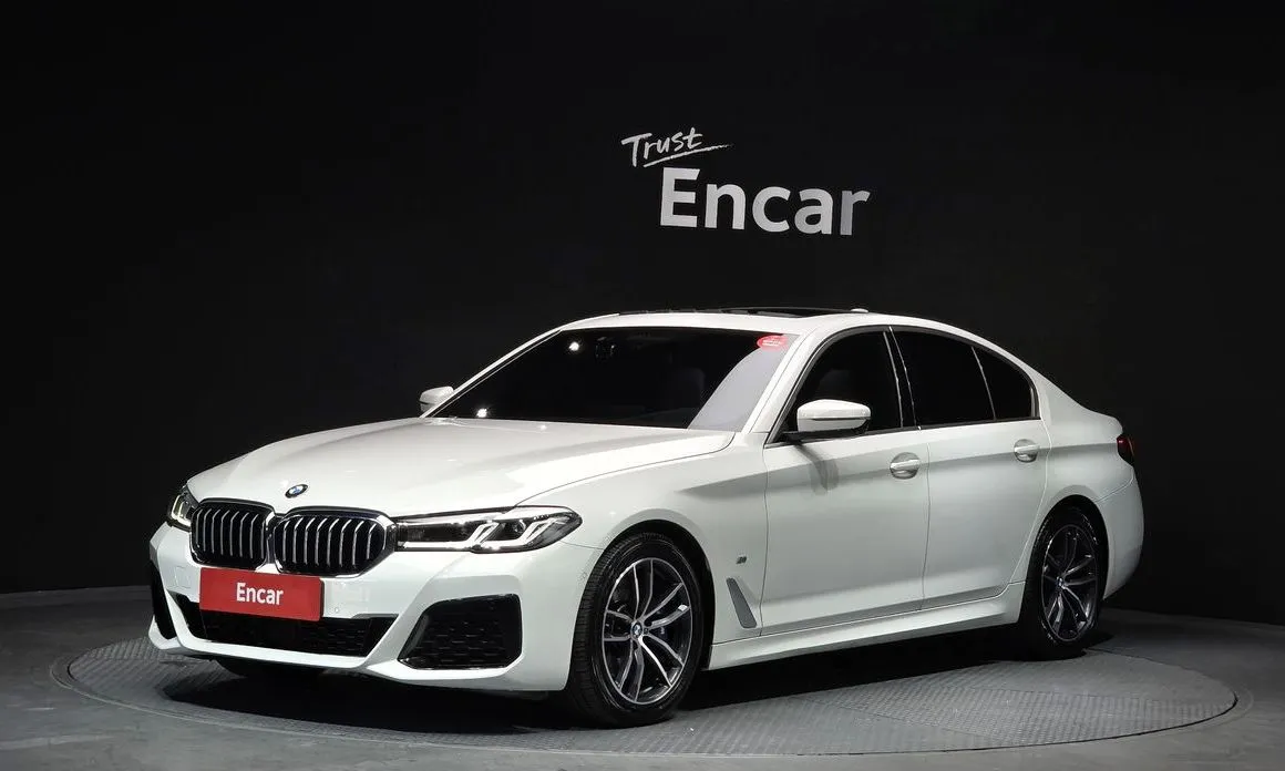 BMW 5-Series — фото 1