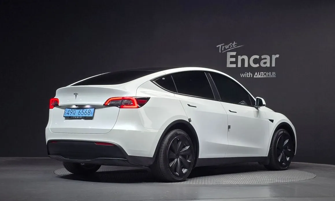 Tesla Model Y — фото 5