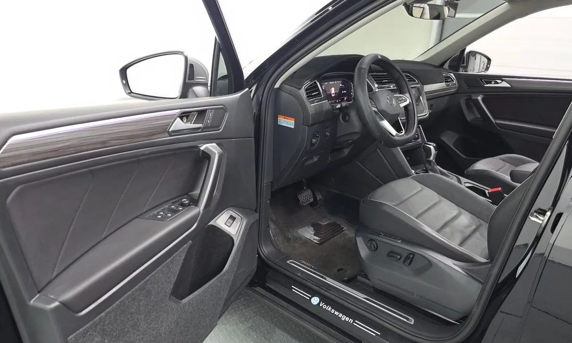 Volkswagen Tiguan — фото 6