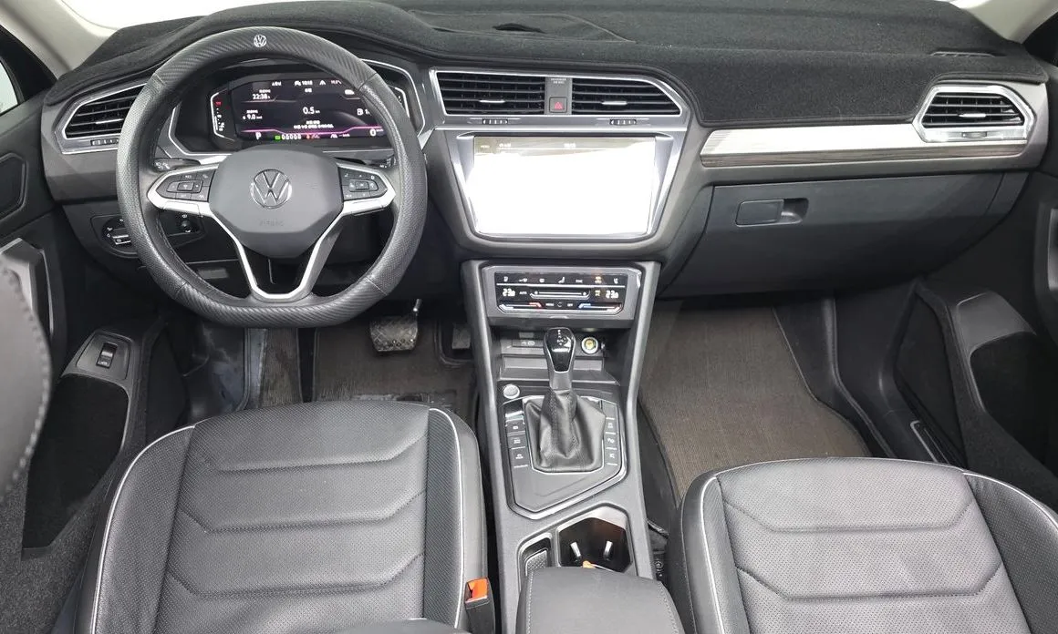 Volkswagen Tiguan — фото 10