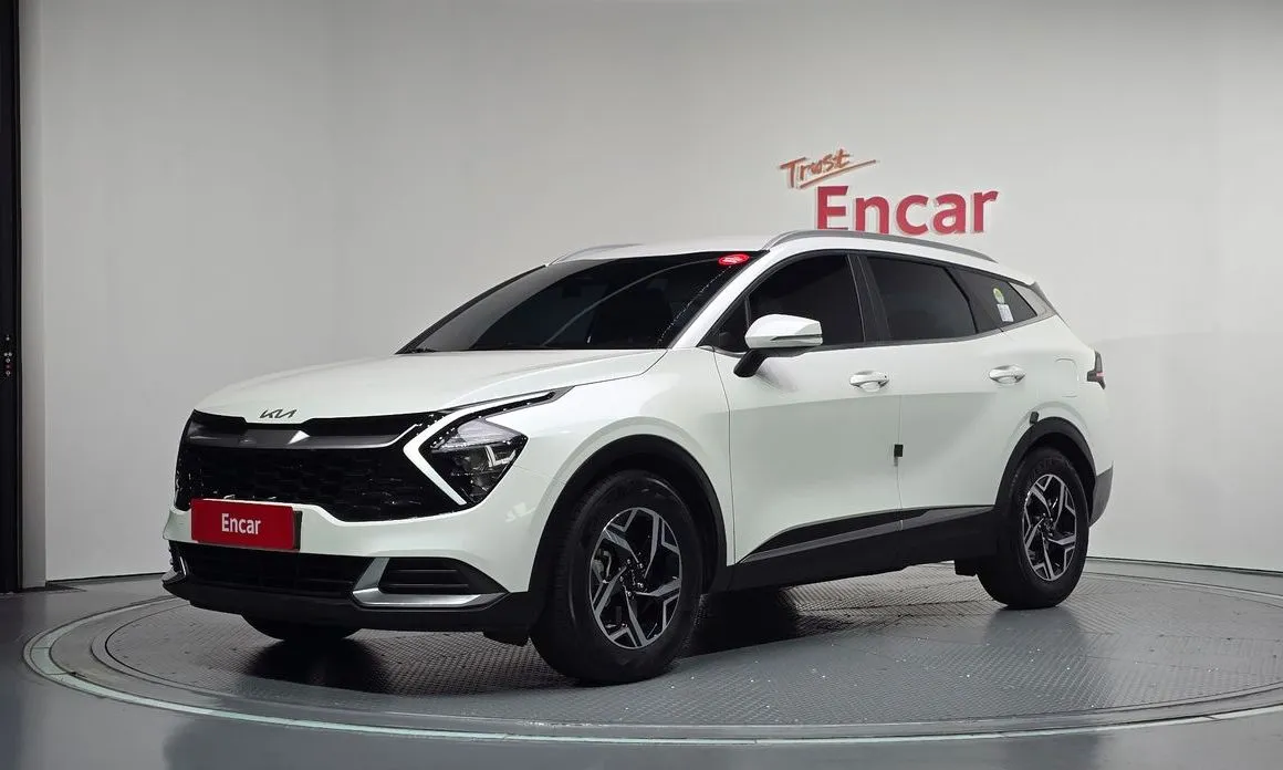 Kia Sportage — фото 1