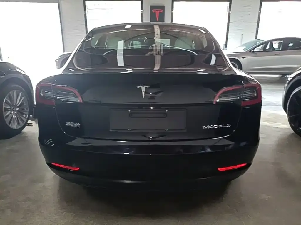 Tesla Model 3 — фото 7