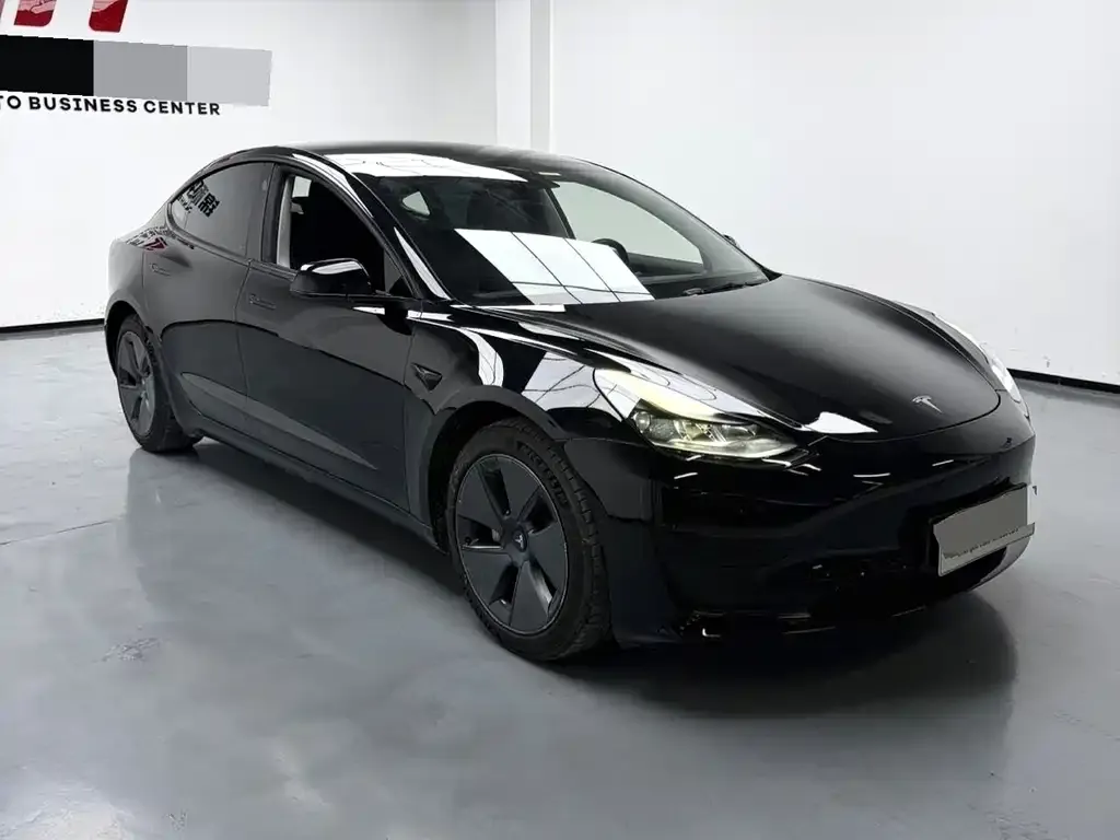 Tesla Model 3 — фото 10