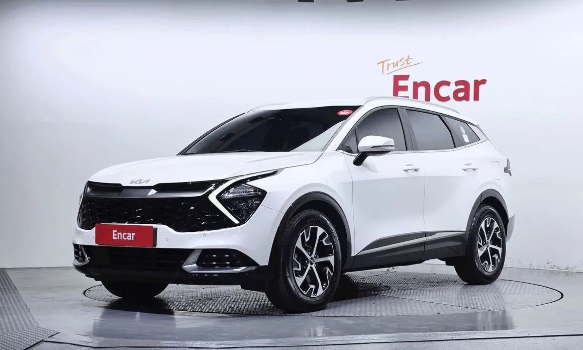 Kia Sportage — фото 1