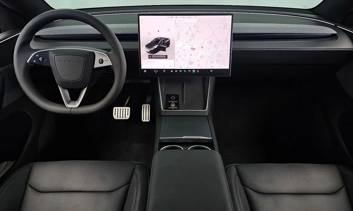 Tesla Model Y — фото 6