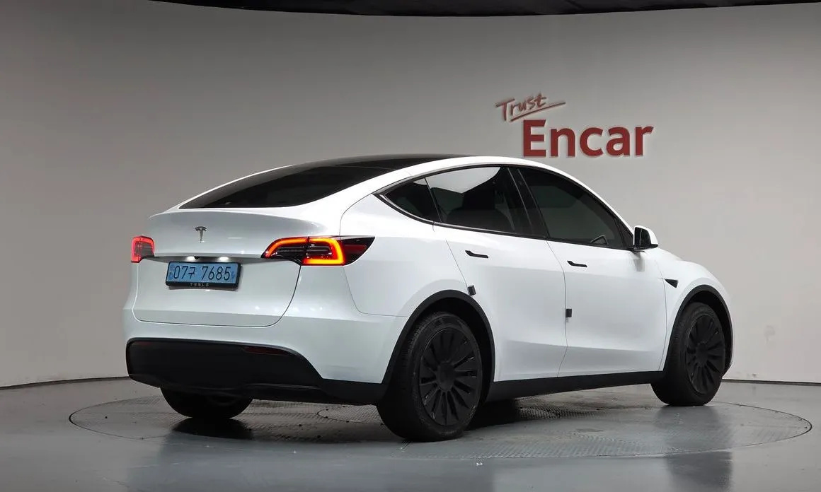 Tesla Model Y — фото 6