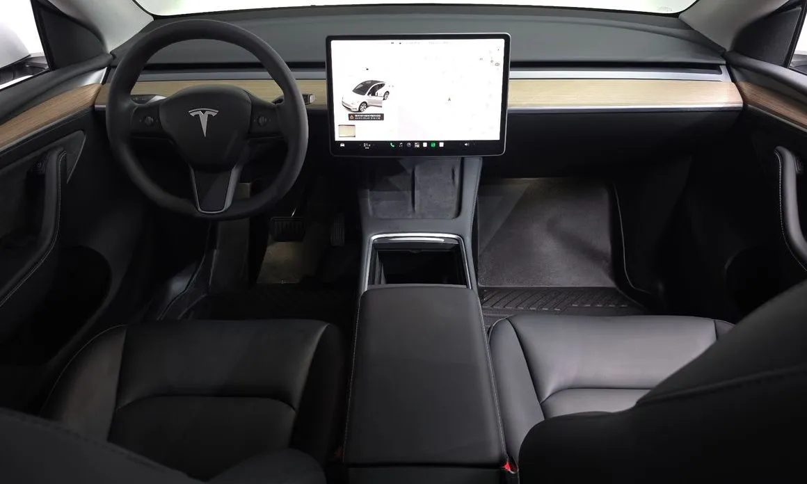 Tesla Model Y — фото 7