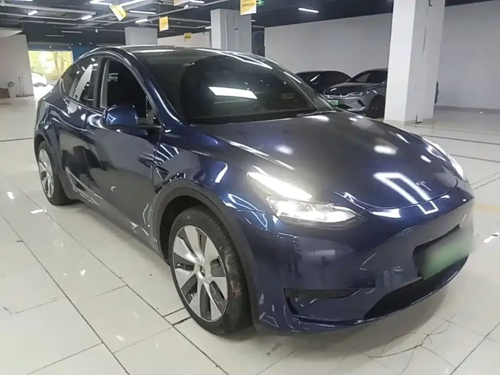 Tesla Model Y — фото 8