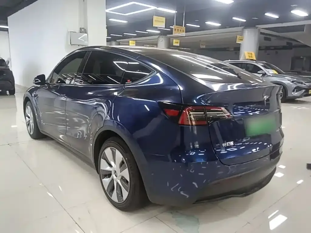 Tesla Model Y — фото 7