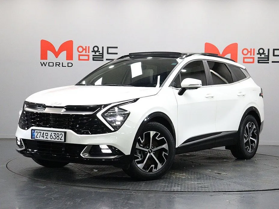 Kia Sportage — фото 1