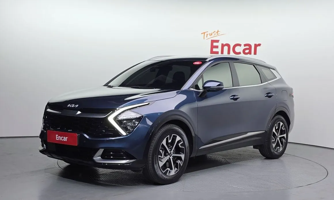 Kia Sportage — фото 1