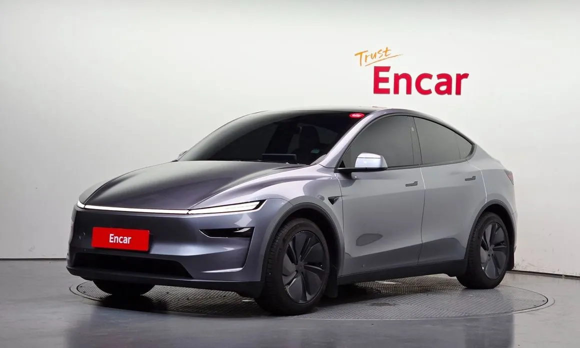 Tesla Model Y — фото 1
