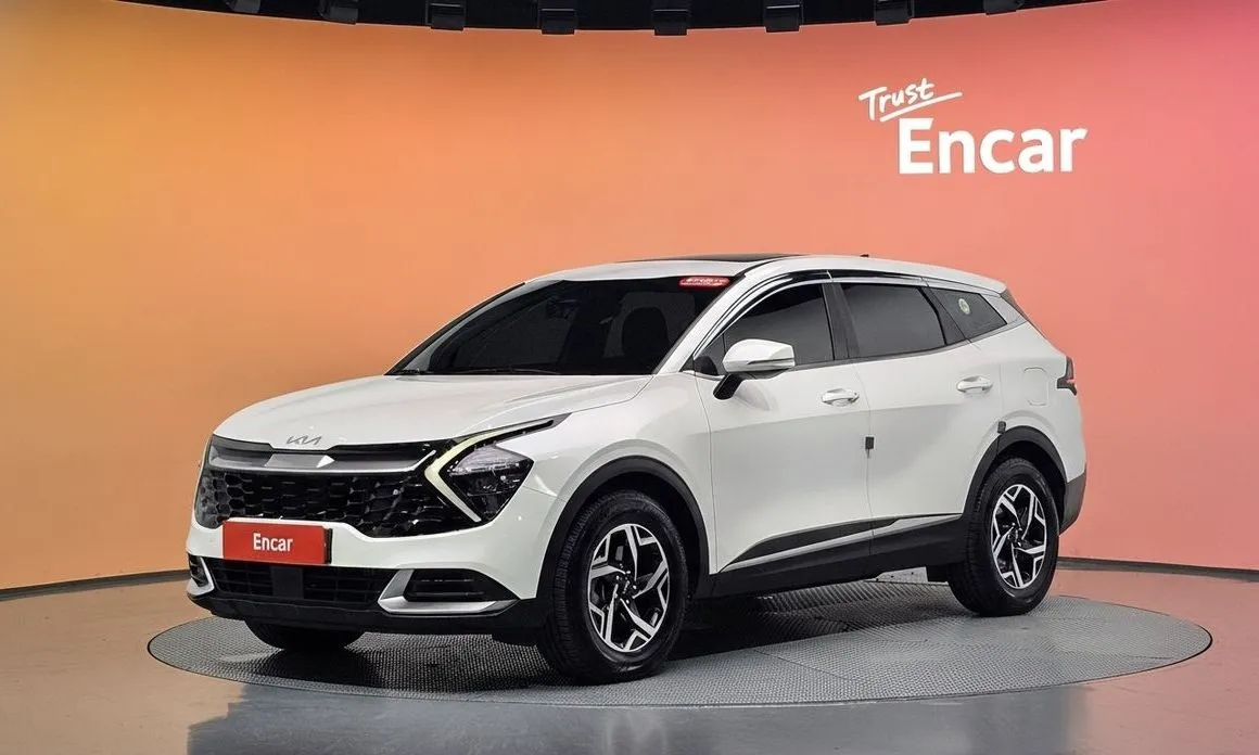 Kia Sportage — фото 1