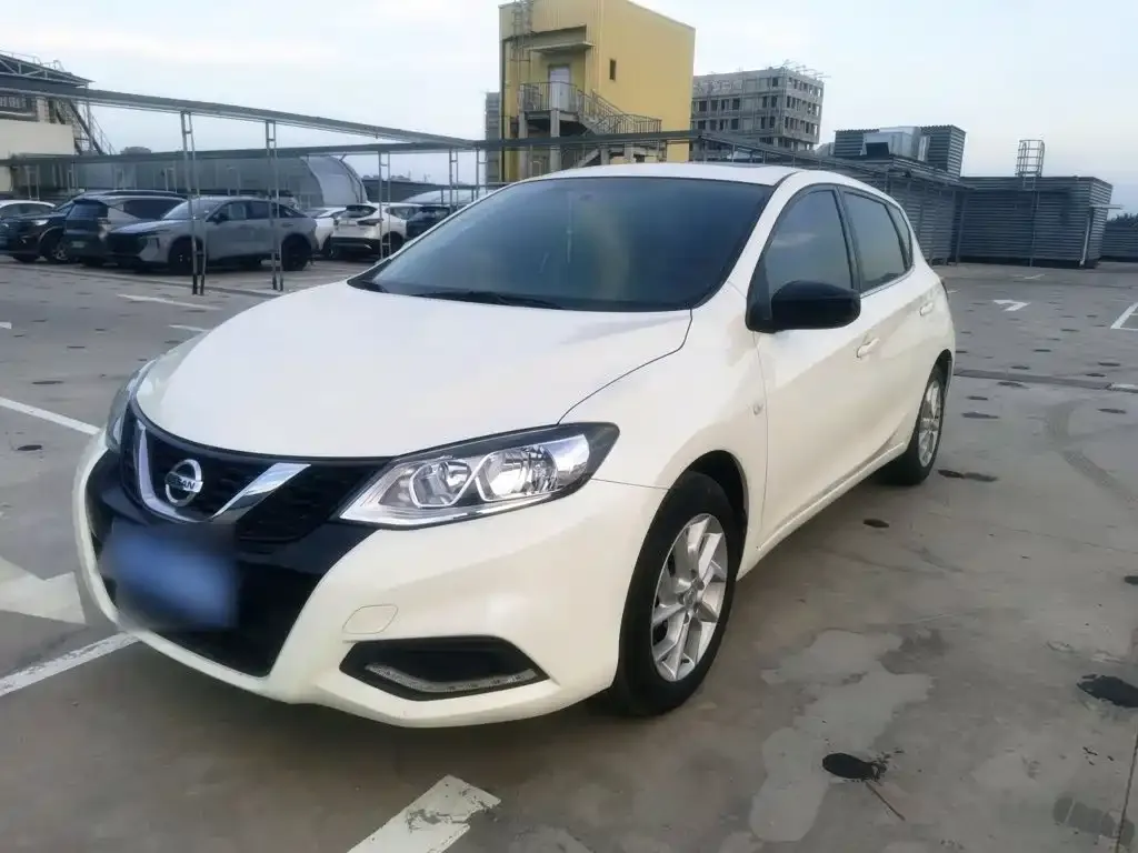 Nissan Tiida — фото 9