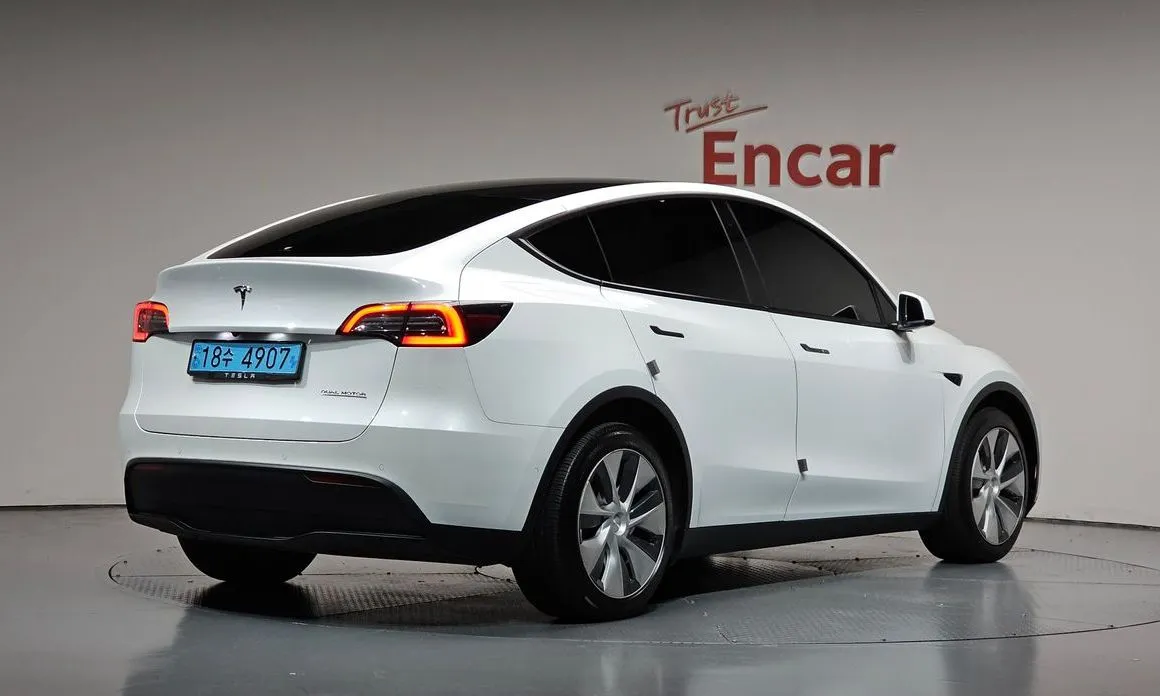 Tesla Model Y — фото 7