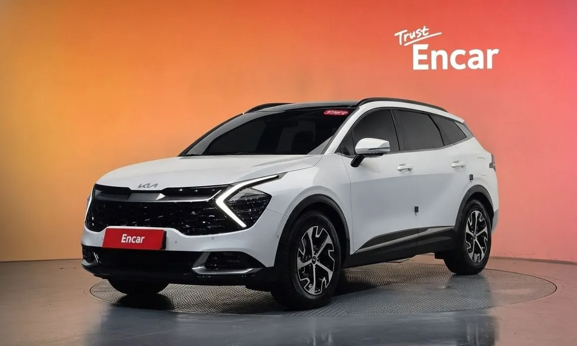 Kia Sportage — фото 1