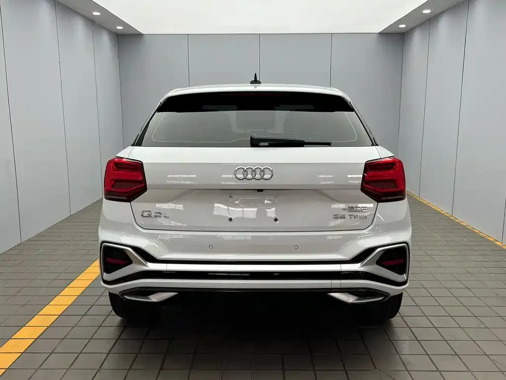 Audi Q2L — фото 3