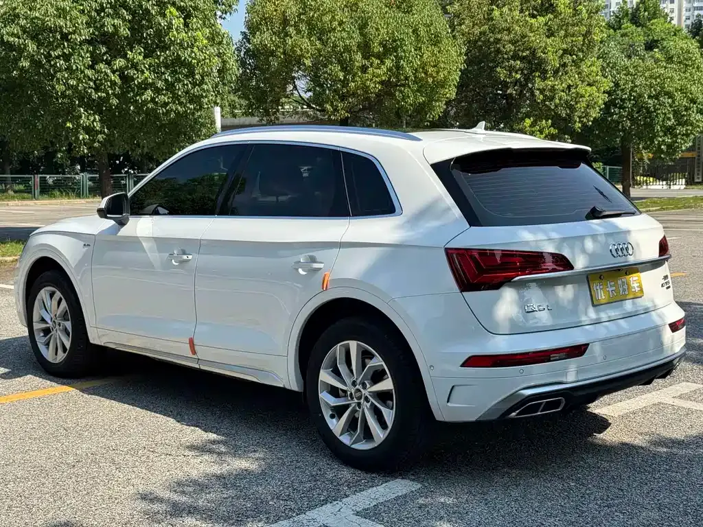 Audi Q5L — фото 10