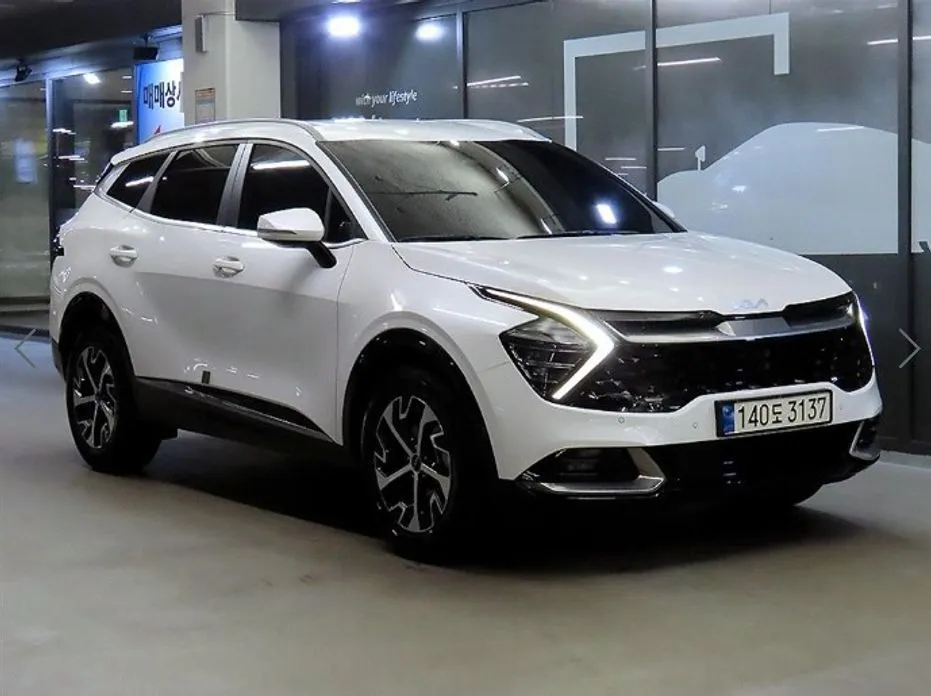 Kia Sportage — фото 1