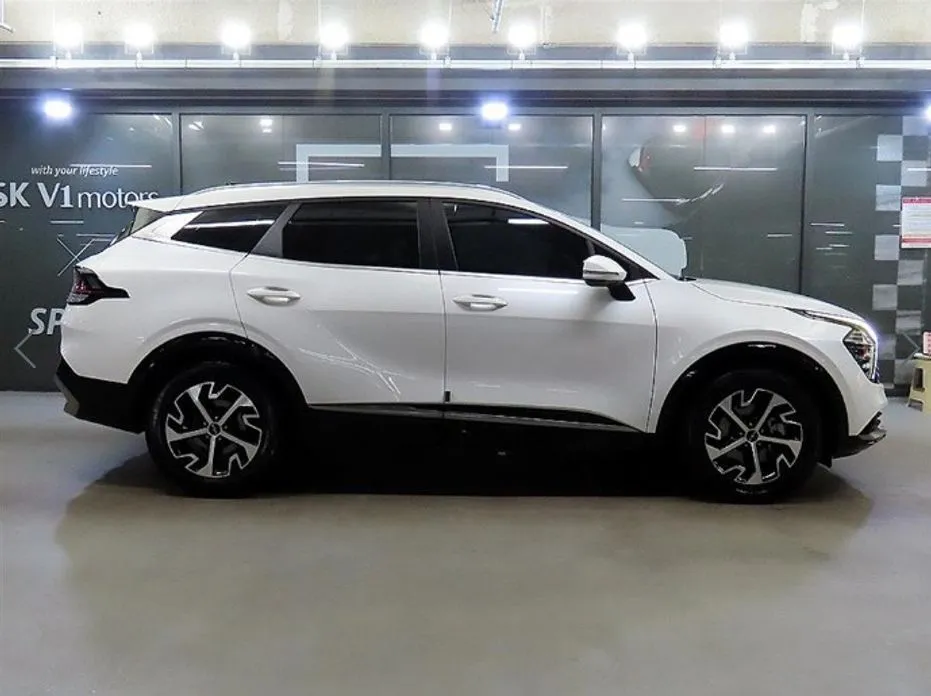 Kia Sportage — фото 5