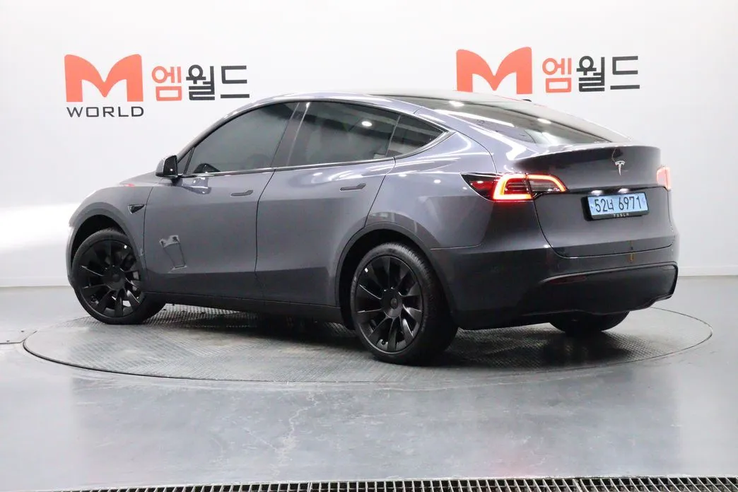 Tesla Model Y — фото 7