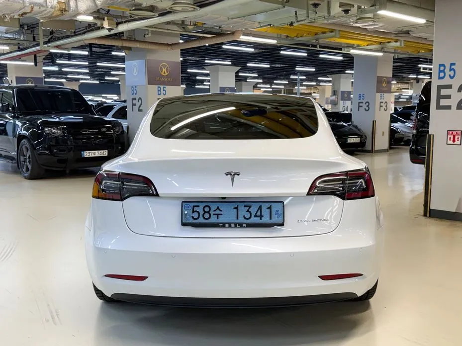 Tesla Model 3 — фото 7