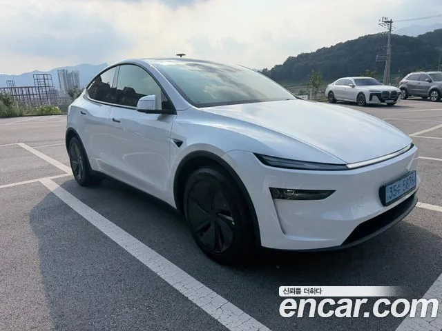 Tesla Model Y — фото 1