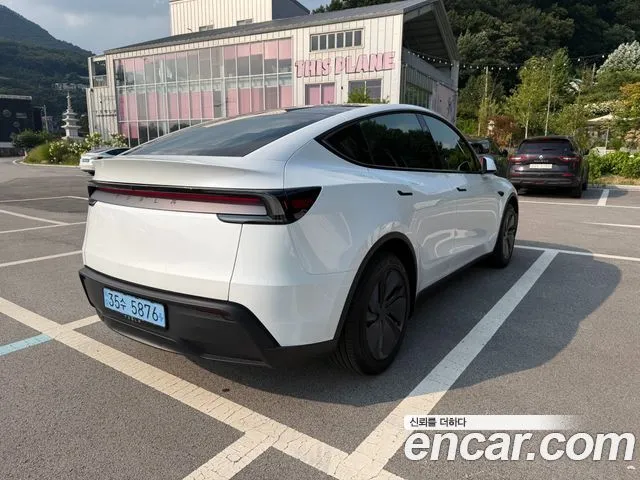 Tesla Model Y — фото 6