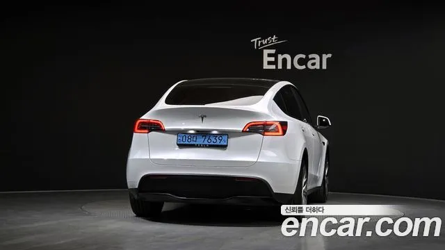 Tesla Model Y — фото 7