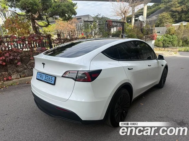Tesla Model Y — фото 9