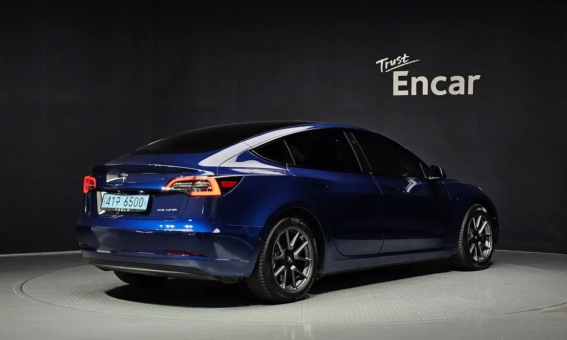 Tesla Model 3 — фото 4