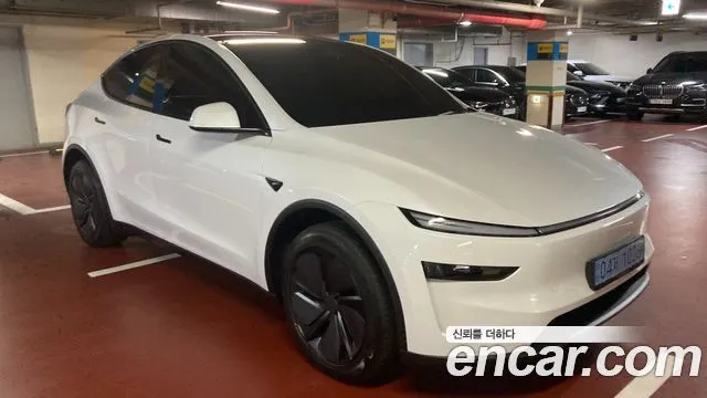 Tesla Model Y — фото 10