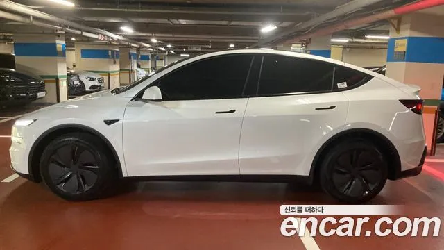 Tesla Model Y — фото 6
