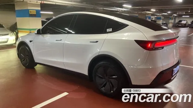 Tesla Model Y — фото 8