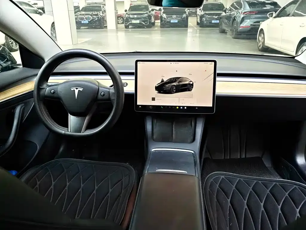 Tesla Model 3 — фото 7