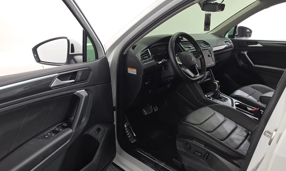 Volkswagen Tiguan — фото 5
