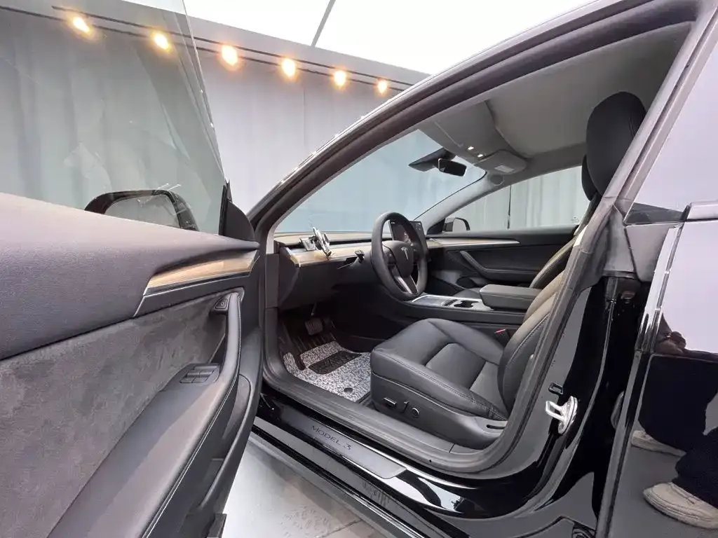 Tesla Model 3 — фото 10
